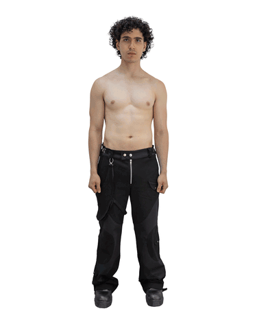 360 view of our survivor unisex baggy pants / jeans in black color with silver elements and detachable sidepocket 