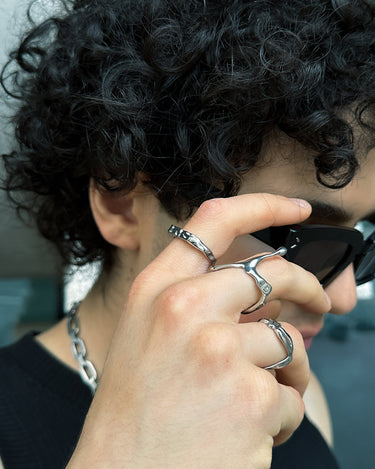 Detail view of our rebirth logo silver ring in silver optic. Stainless steel ring with the bms logo and waterproof