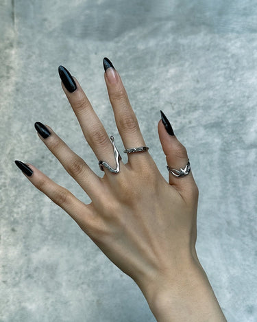 On hand view of our rebirth logo silver ring in silver optic. Stainless steel ring with the bms logo and waterproof