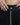 Detail view of our survivor unisex baggy pants / jeans in black color with silver elements and detachable sidepocket 
